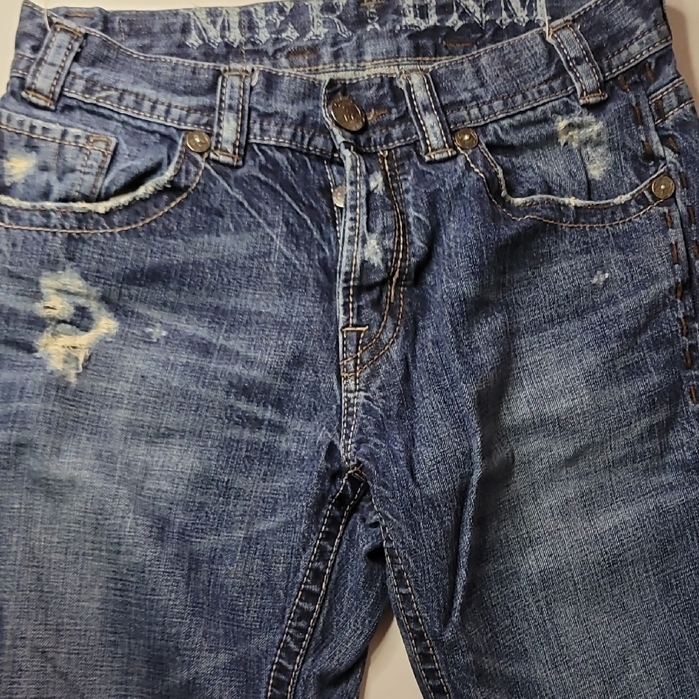 Distressed Blue Jeans